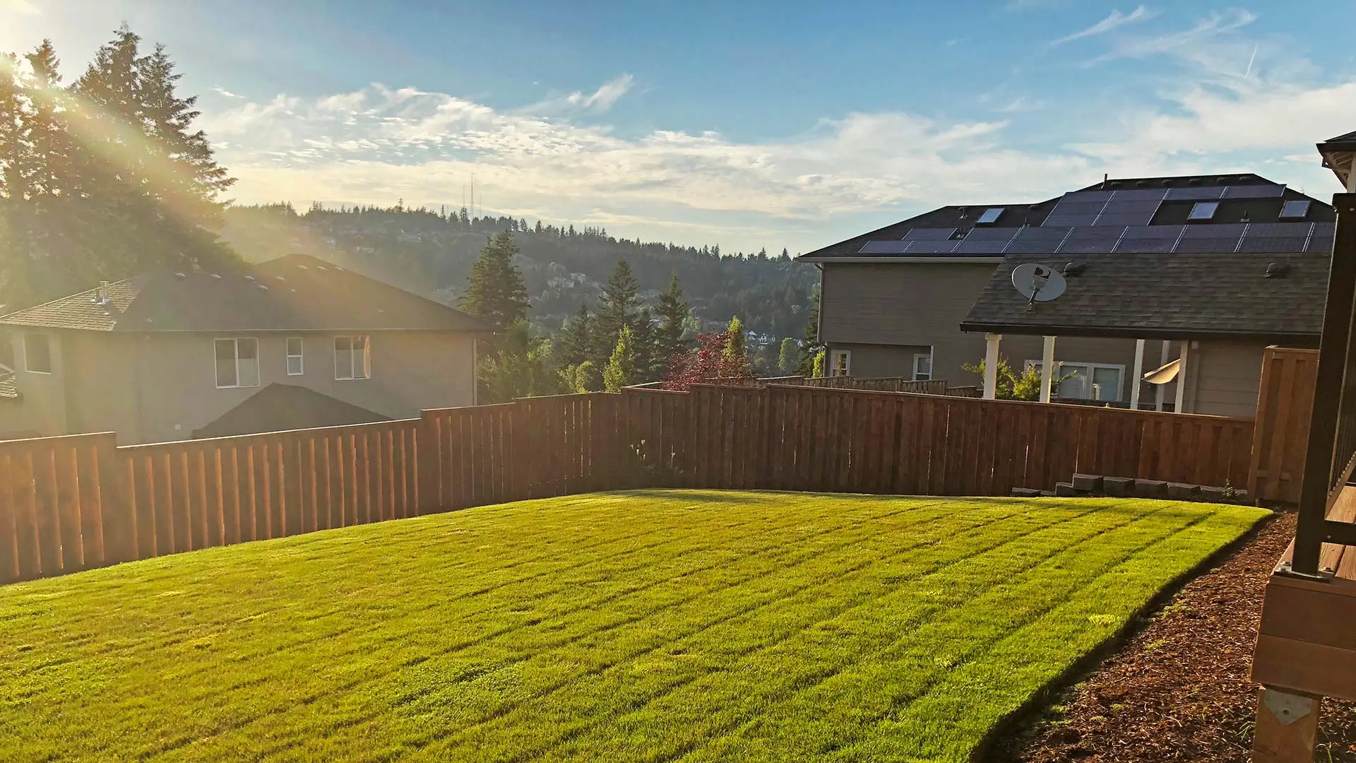 A recently mowed and fertilized lawn on a sunny day in Sunnyside, OR.