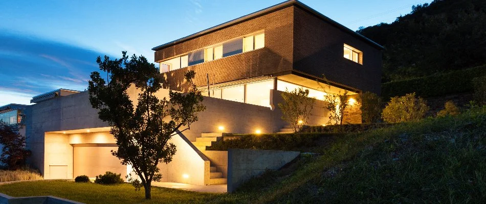 House in Portland, OR, with warm white outdoor lighting.