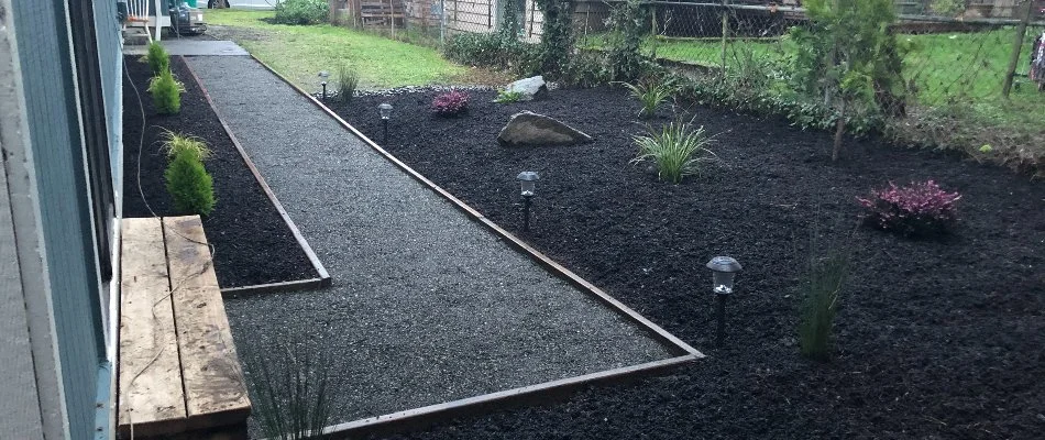 Walkway along a mulched landscape area in Gresham, OR.