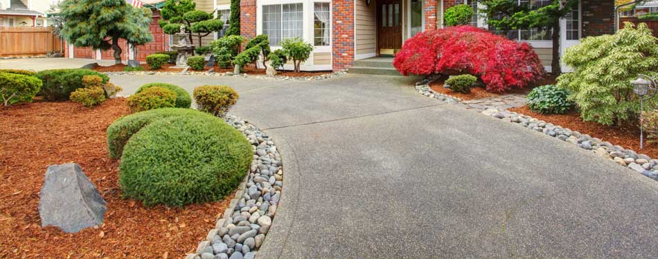 New mulch and rock landscape installation at a home in West Linn, OR.
