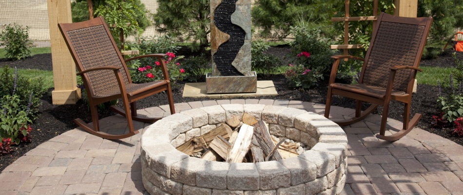 Custom  stacked stone fire pit with space for loved ones to  gather near Damascus, OR.