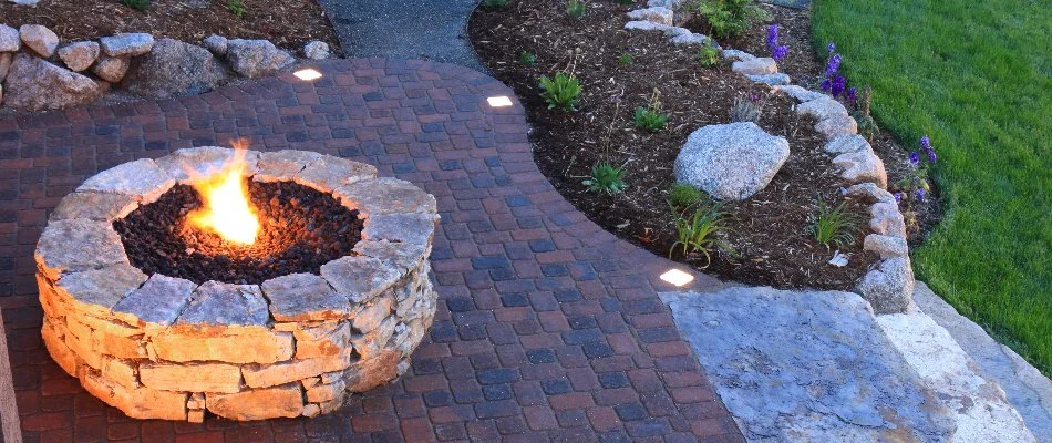 A fire pit and landscape bed in Oatfield, OR.
