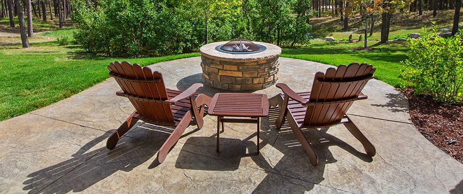 Fire pit installed over backyard patio in Gresham, OR.