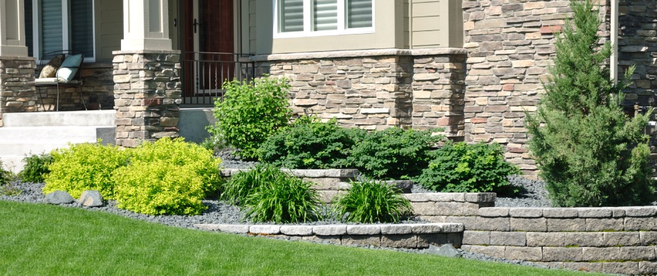 Retaining wall holding landscape bed for home front in Beaverton, OR.
