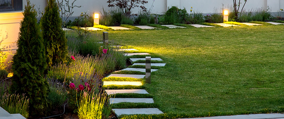 Pathway with lights installed throughout the backyard in Damascus, OR.
