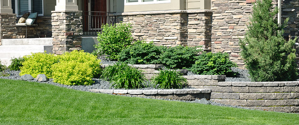 A retaining wall in front yard landscaping in Gresham, OR.