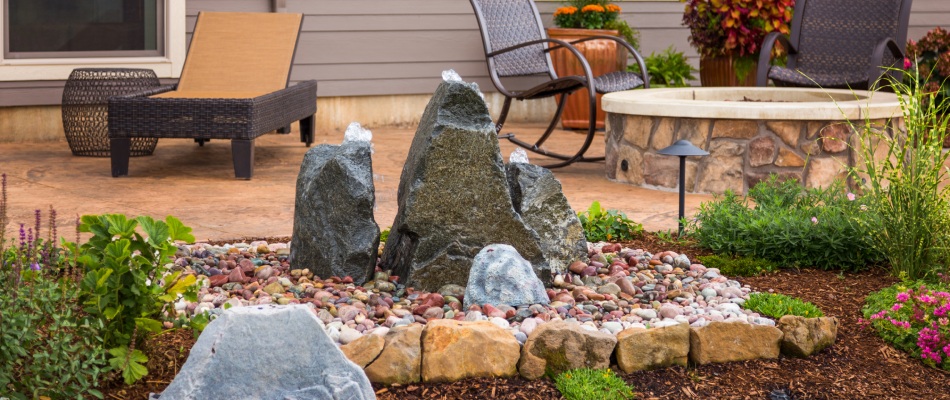 Water bubbler feature in landscape bed in Happy Valley, OR.