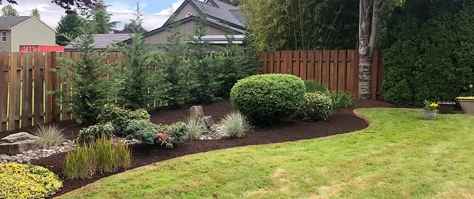 Portland, Oregon home with fresh mulch bed and landscape design.